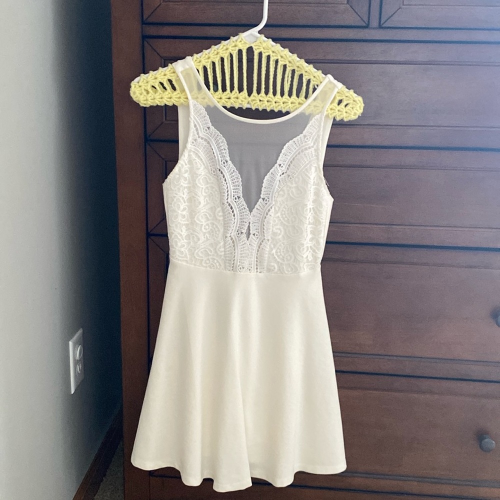 Small, white Lulus dress. Worn once for bridal shower. In great condition!